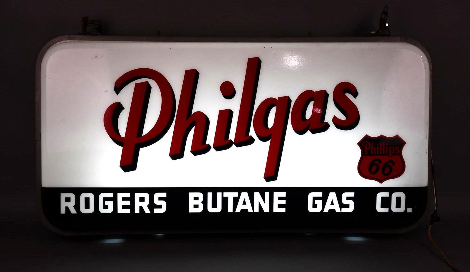 Phillips 66 (old logo) Philgas Plastic Lighted Sign (TAC): rated 9, 24"x48"x9", the molded plastic insert has excellent color, nice, is mounted in it's original metal light box with a Neon Products plastic lighted badge, the privilege panel sa