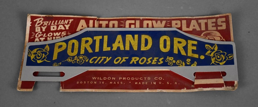 NOS Portland Oregon Plate Topper: Topper is rated 8.9, mounted on the original point of sale cardboard, excellent color on the topper, reflective lettering, original paper shows some wear and weathering