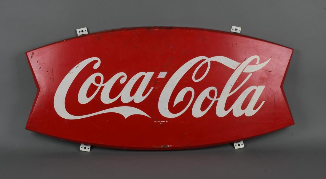 Coca-Cola Fish Tail Logo Metal Sign (TAC): rated 7, 19.5"x42", the SST diecut embossed sign, has wear and fine scratches, marked A-M. TAC #046104