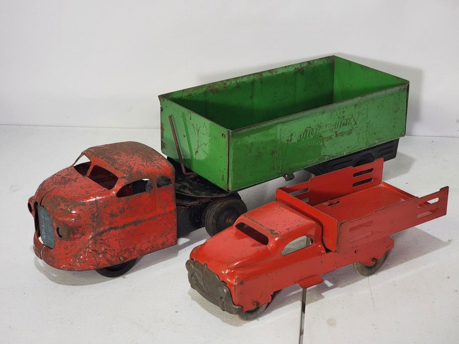 Wyandotte Side Dump & Stake Press Steel Trucks (1 of 3)