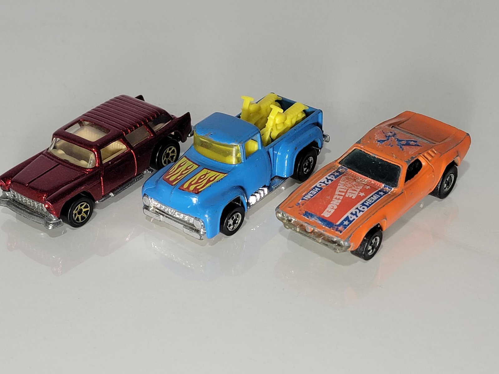 3-Hot Wheels Black Wheel Cars: rated 7 to 9, Dixie Challenger has wear and scratches, Nomad is nice but has the wrong wheels, pickup is nice.