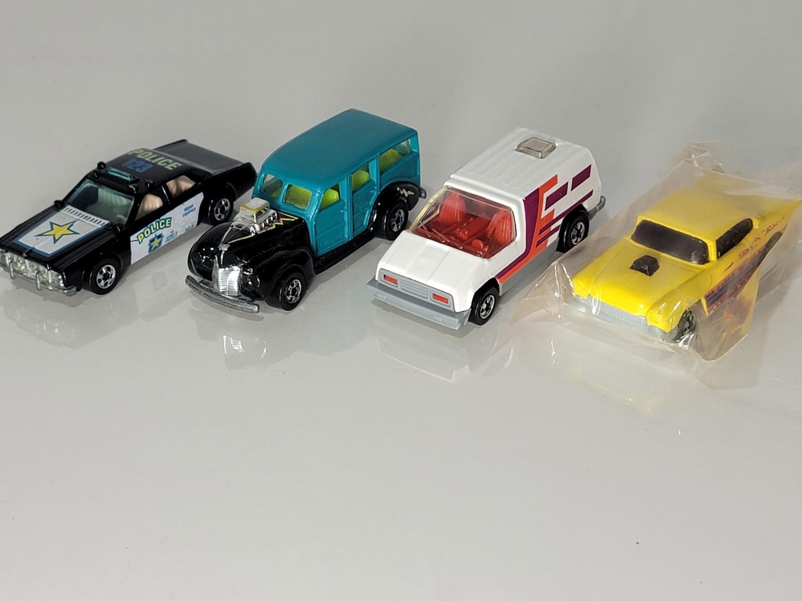 4-Hot Wheels Late 1970's Cars: rated 9, all in good condition, may have very light wear, one still in original package.