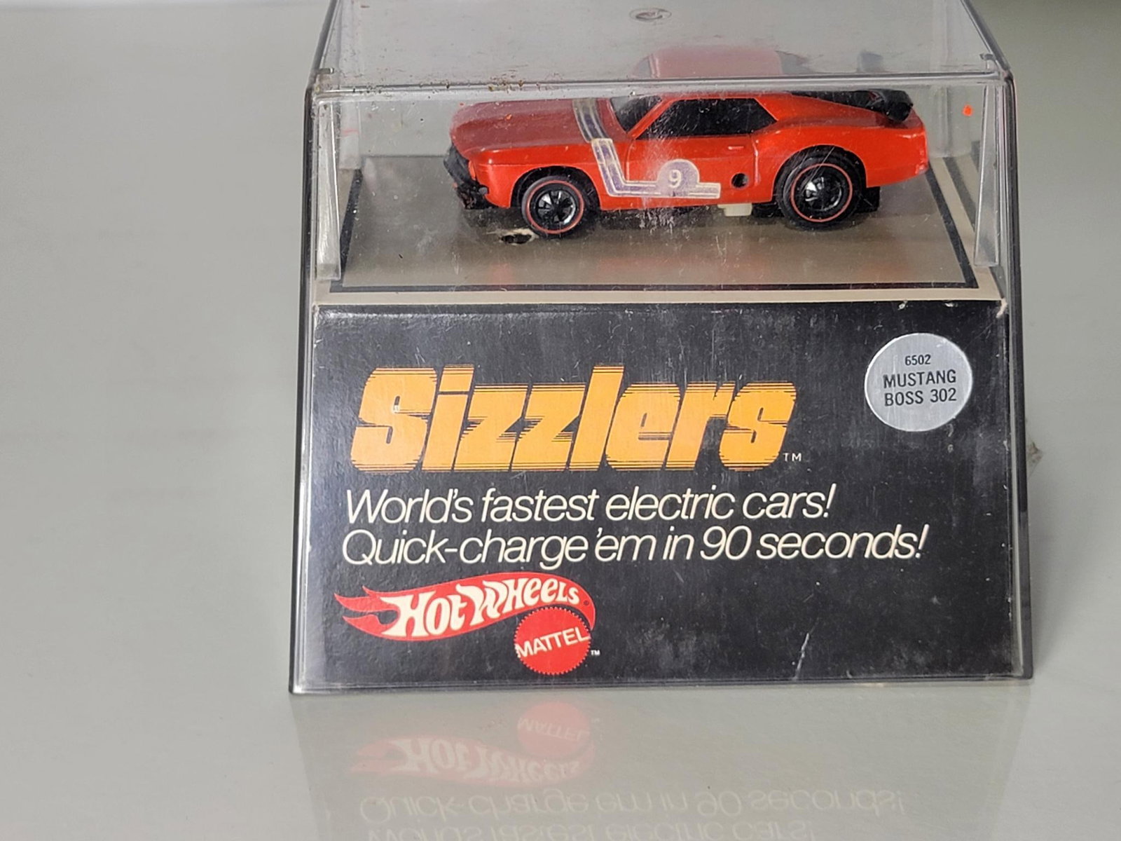 Hot Wheels Sizzlers Mustang Boss 302 #6502: rated 9, the car is loose but in very good condition, plastic case has light wear.