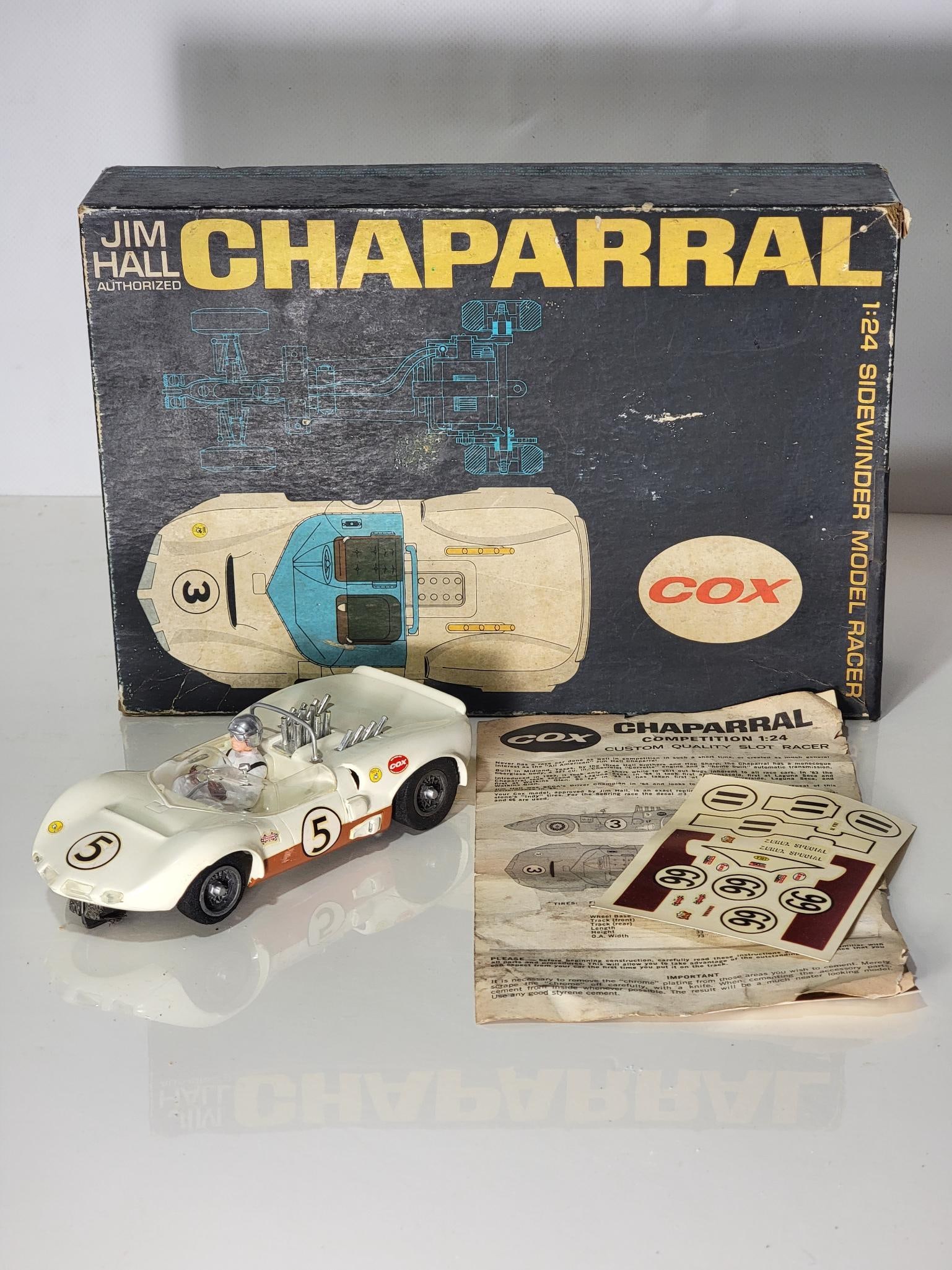 Cox Jim Mall Authorized Chaparral 1/24 Scale Sidewinder Model Racer w/Box: model has been assemble nicely, has instruction and extra decals, box has good color has wear and minor damage, also comes with an extra top that is in poor condition.