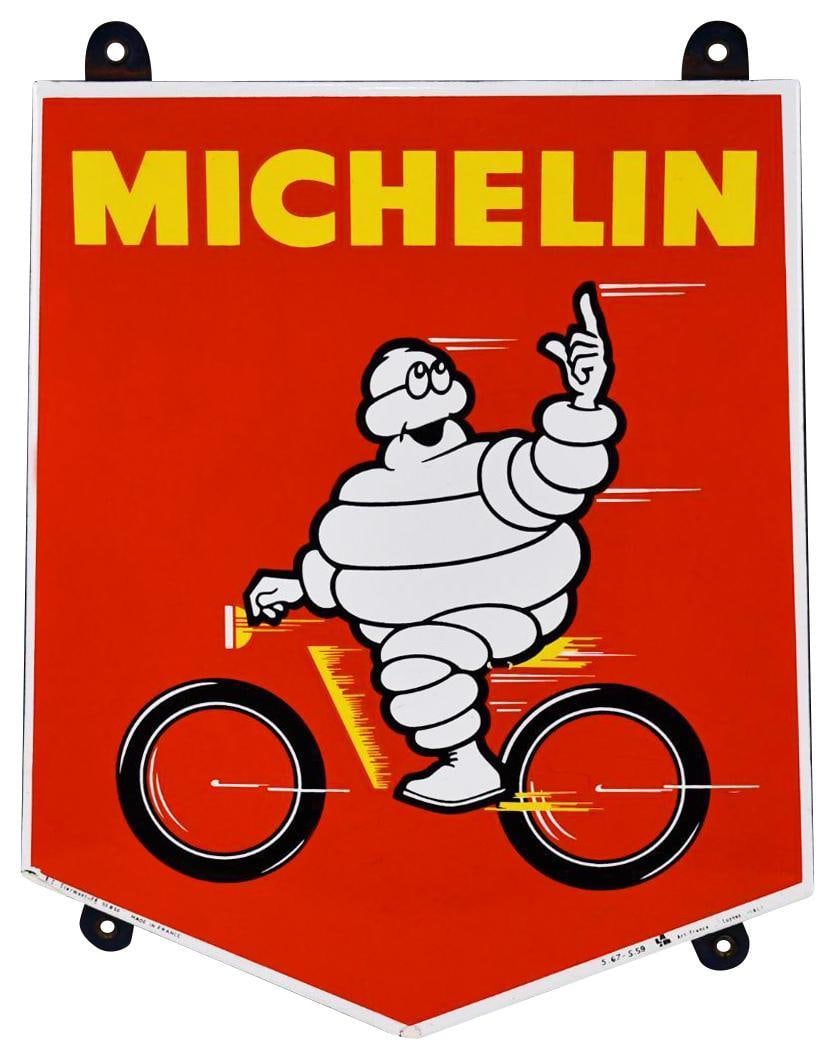 Michelin w/Bibendum riding a Motorcycle Porcelain Sign (TAC): rated 9, 17.75'x15", the SSP rolled edge sign has excellent color and gloss, has tiny chip at bottom point, marked Art-France. TAC #043190