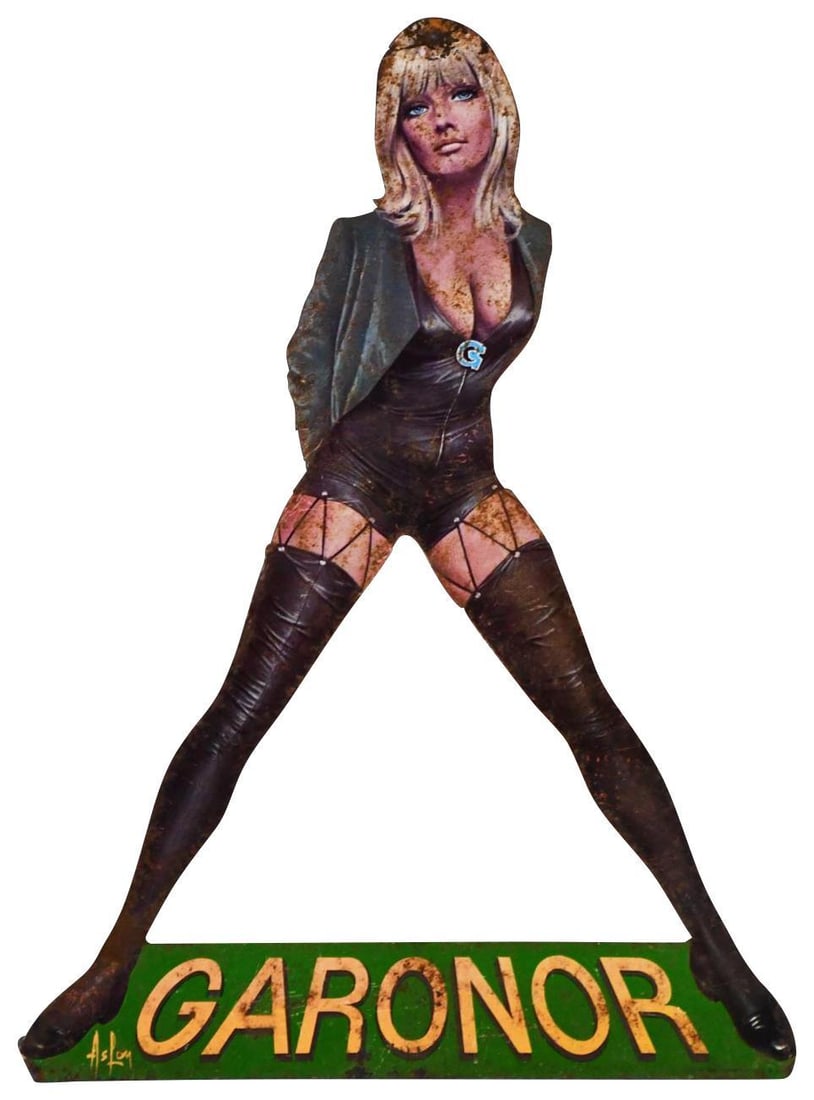 Rare Garonor (tires) Pin-up Metal Sign (TAC): rated 6.5, 19"x13.5", the SST diecut sign has wear and rust spots. TAC #043227