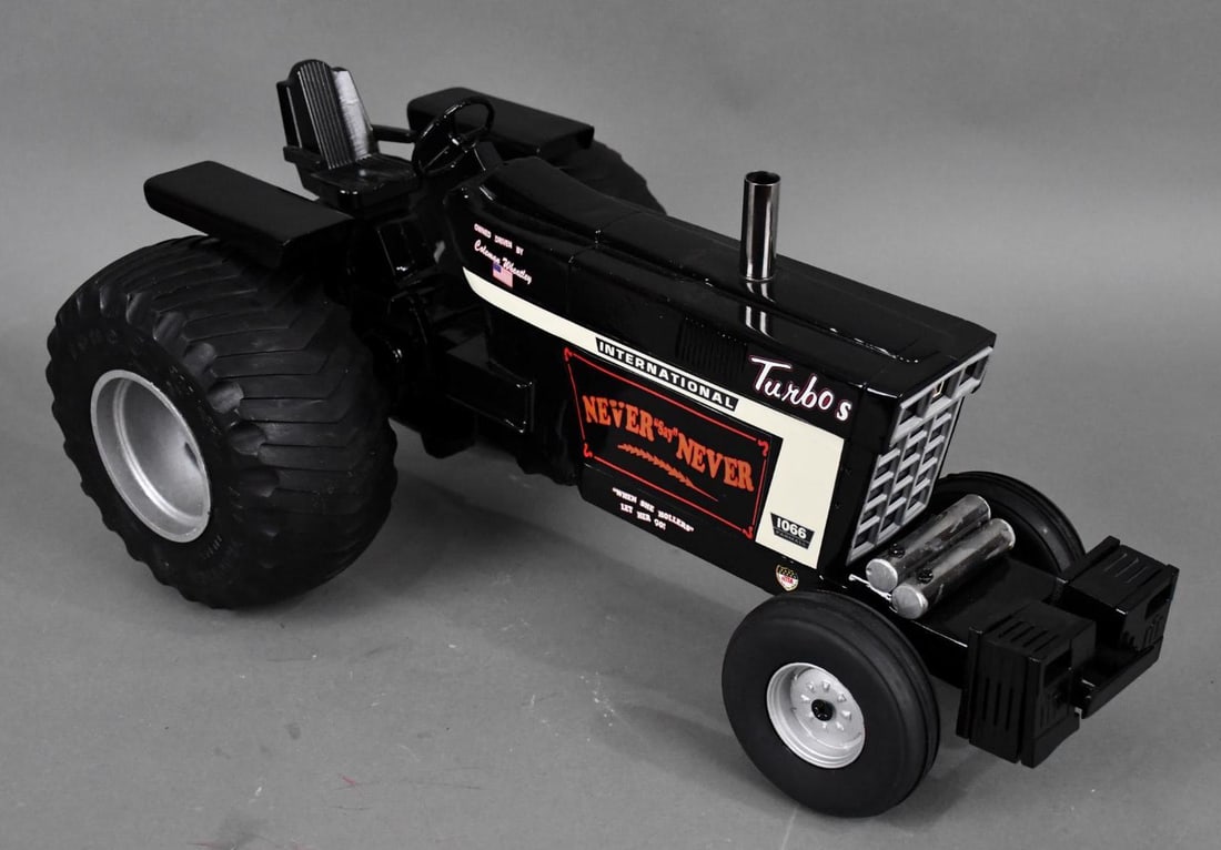 Custom 1/8 IH 1066 "Never Say Never" Pulling Scale: 1/8 scale, amazing detail with the weights, the custom rubber tires, very cool piece, amazing detail, "AWESOME!" 