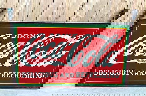 Drink Coca-Cola "Delicious & refreshing" Porcelain Sign (TAC): rated 8.5"x36"x60", the DSP sign has good color and gloss, has wear and a few chips in the fields, marked Tenn Enamel, dated 1932. TAC #059307