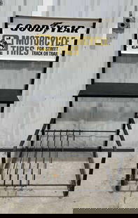 Goodyear Motorcycle Tires "For Street or Trail" Metal Rack Sign (TAC): rated 9, 15"x30", the DST rolled edge sign has good color and shine, rack measures 59"x32"x24", has wear. TAXC #057996