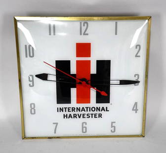 IH International Harvester Lighted Dealership Clock: rate 8.9, 15.5" x 15.5", Single Sided Lighted Clock, has great color, shows only 2 small areas of paint loss in the logo, marked Pam Clock Co, Lights and Works