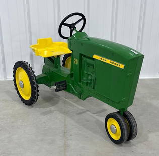 Restored Ertl John Deere 4020 Pedal Tractor: 1965 model, in good condition.