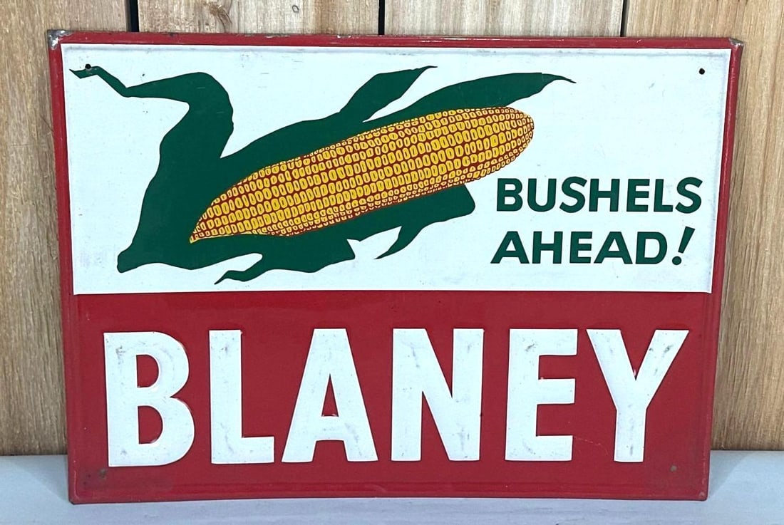 Blaney Seed Dealer Metal Sign (TAC): rated 9, 12"x16", the SST embossed sign has good color and shine, has light wear. TAC #059229