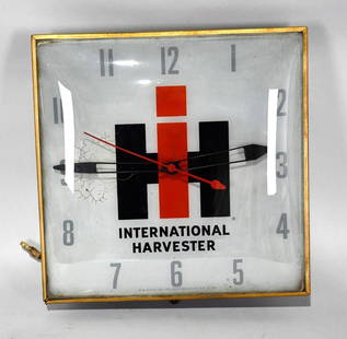 IH International Harvester Lighted Dealership Clock: rate 7.5, 15.5" x 15.5", Single Sided Lighted Sign, shows some wear and age from use, marked Pam Clock Co.