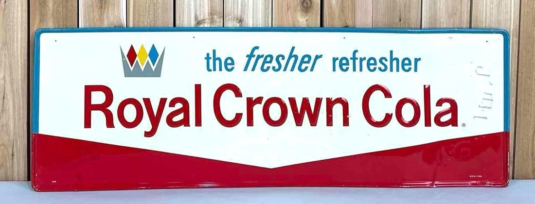 Royal Crown Cola Metal Sign (TAC): rated 8, 18"x54", the SST embossed sign has good color and shine, has light wear and cease in the right-hand field, marked MCA. TAC #059371