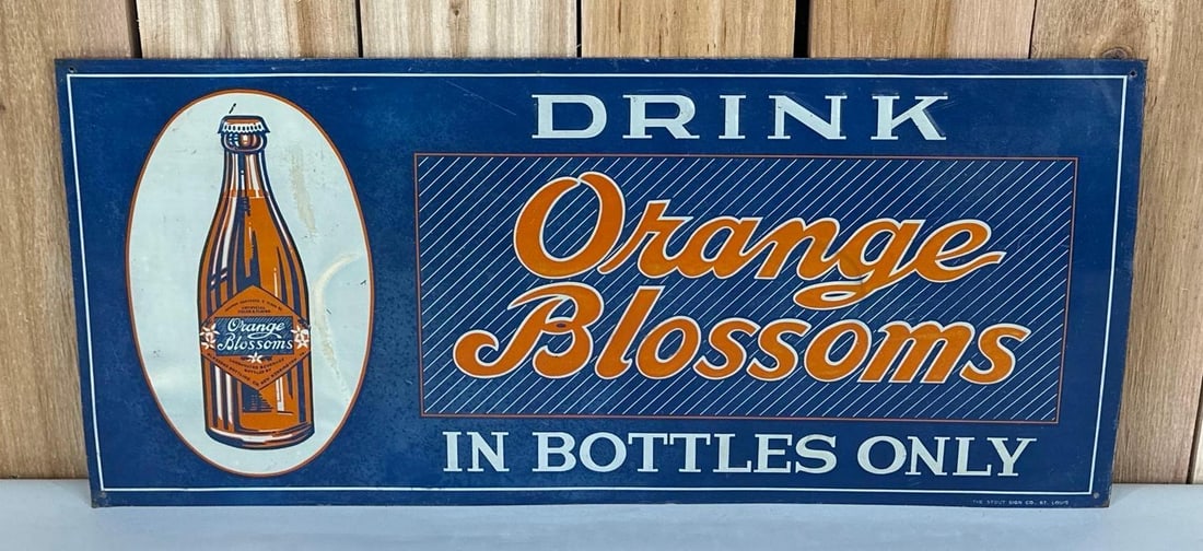 Drink Orange Blossoms w/Bottle Metal Sign (TAC): rated 7.5, 12.75"x27.75", the SST embossed sign has wear and damage in the image, marked Stout. TAC #059389