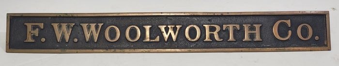 Brass F.W. Woolworth Co. Metal Sign