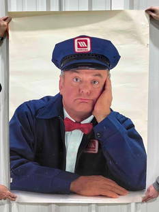 Paper Poster of the Maytag Man: rated 8, 56"x45", has good color, has wear and creases at the bottom.