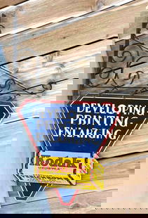 Kodak Developing Printing Enlarging Metal Sign (TAC): rated 8, 17"x17", the DST diecut sign has good color and shine, display has wear and fine scratches, reverse has more scratches, comes with original bracket. TAC #032231