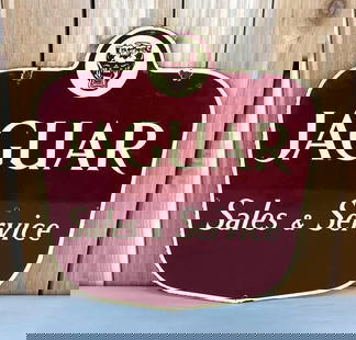 Jaguar Sales & Service w/Logo Porcelain Sign (TAC) (small): rated 8.5, 19.75"x18.75", the SSP diecut sign has good color and gloss, has a few small chips in the field, has five factory holes, three have chips. TAC #058980