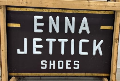 Enna Jettick Shoes Metal Sign w/Embossed Milk Glass Letters