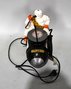 Small Michelin Bibendum Air Compressor Restored: has been professionally restored, has cord and air hose, has both original end caps, do not know if it works has European plug in.