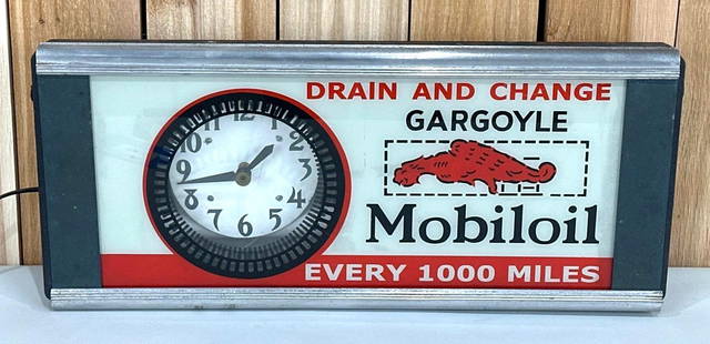 Mobiloil Gargoyle Lighted Clock: the glass lens is new, the metal light box is old, lights up and looks great.&nbsp;