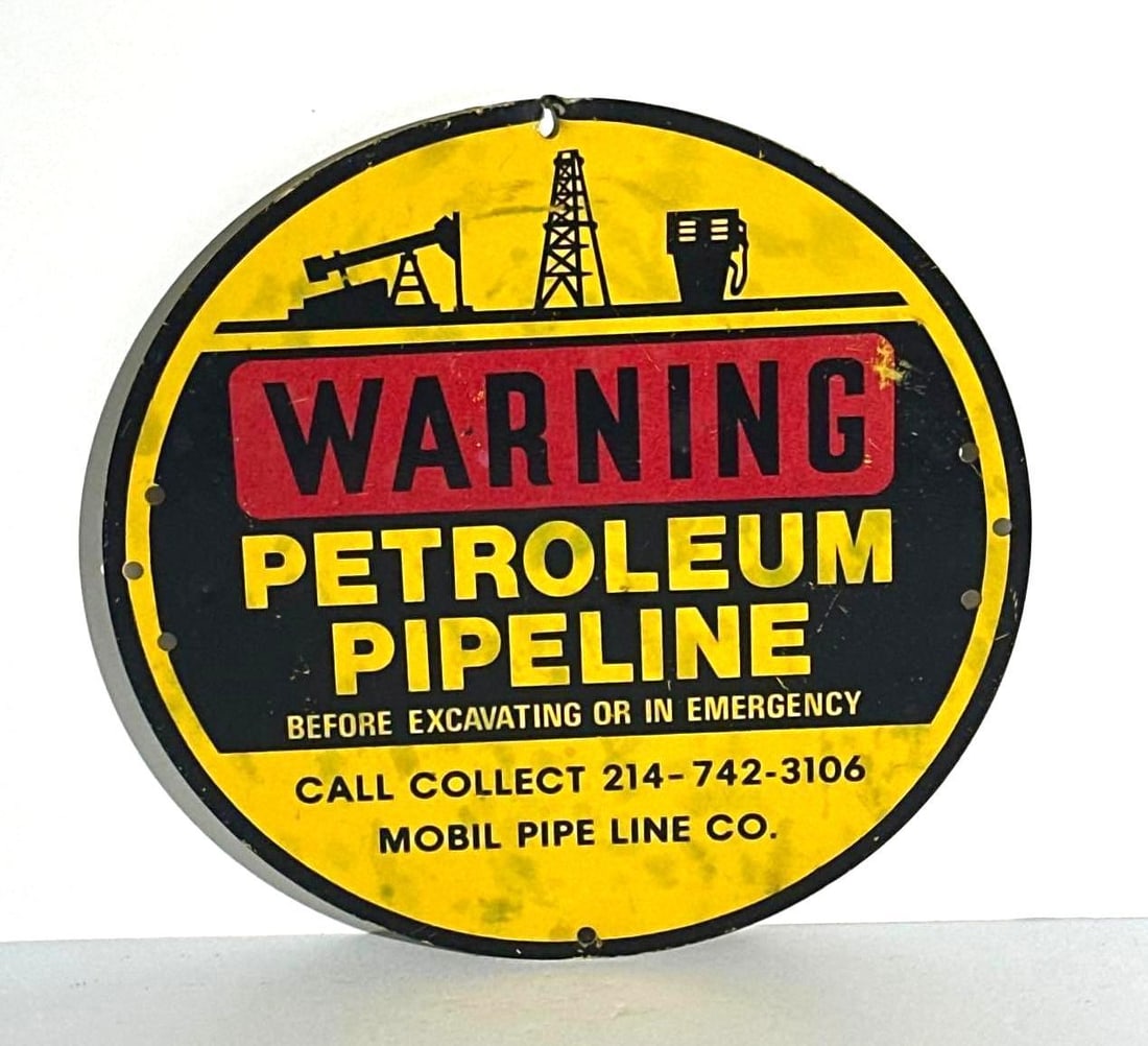 Mobil Waring Pipeline Metal Sign: rated 7.5, 11.75", the SST sign has wear and scratches. This lot can be picked up in Tidioute, PA on September 18 - 22 or this lot can be taken back to our facility to be shipped.