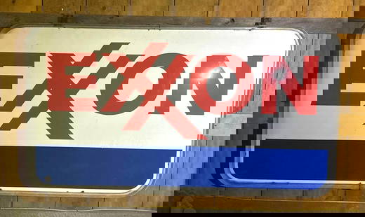 Exxon (Gasoline) Porcelain ID Sign: rated 8.9, 84ā x 46ā, Double Sided Porcelain Sign. Has good color and gloss. In the original ring, clean. This Lot must be picked up in Tidioute, PA on September 18 - 22.