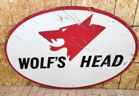 Rare Wolf's Head Metal Sign: rated 7.5 &amp; 6.5, 59&#34;x40&#34;, the DST oval sign has good color, has wear and large scratches, reverse has more, marked A-M, dated 1969. This Lot must be picked up in Tidioute, PA on September