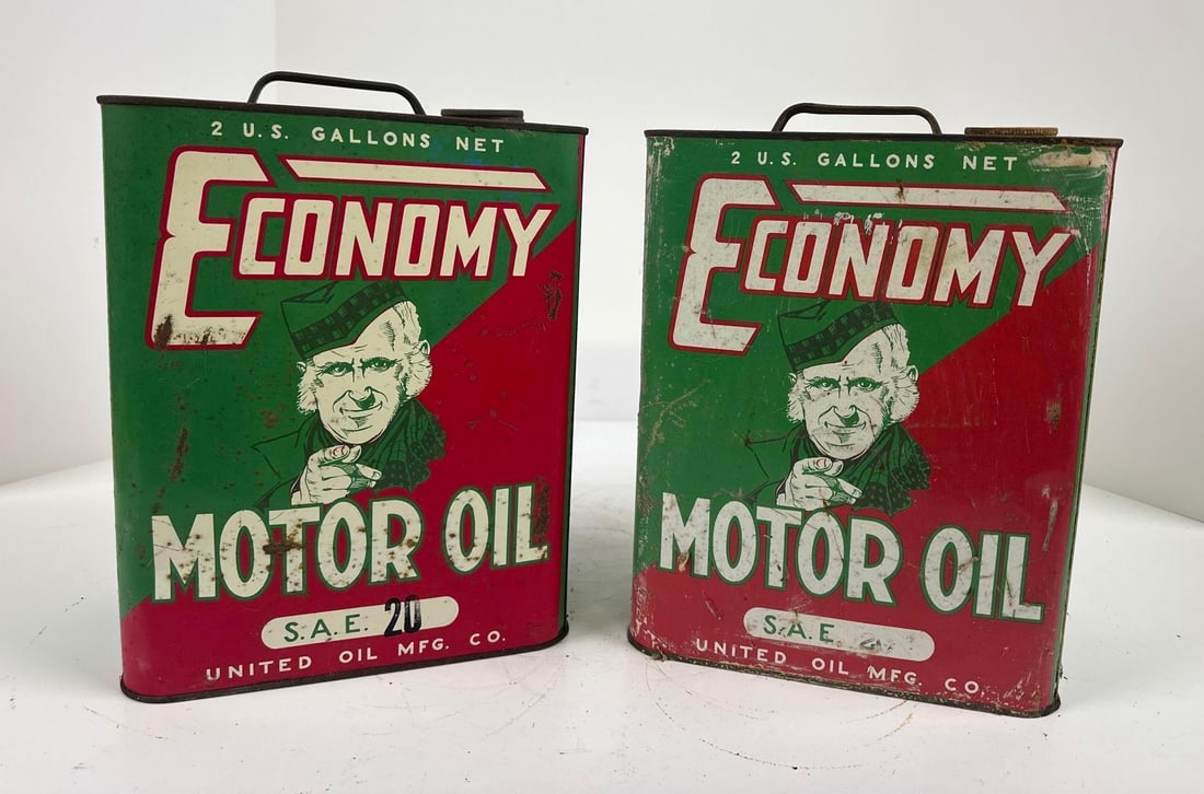 2-Economy Motor Oil w/Logo Two-Gallon Rectangle Metal Cans: rated 6.5 & 7.5, both are empty, one has more wear and rust spots. This lot can be picked up in Tidioute, PA on September 18 - 22 or this lot can be taken back to our facility to be shipped.