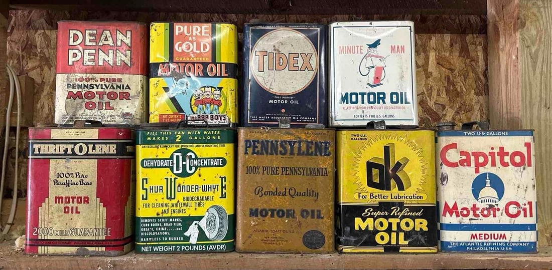 9 Two-Gallon Rectangle Metal Motor Oil Cans: rated 5 to 7, all are empty. This Lot must be picked up in Tidioute, PA on September 18 - 22.