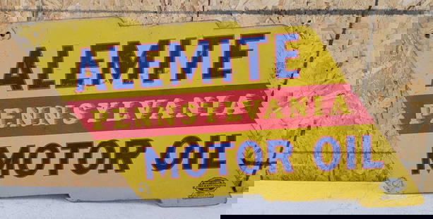 Alemite Motor Oil Metal Flag Sign: rated 7.5, 22&#34;x40&#34;, the DST diecut sign has good color, has wear, fine scratches and fading. This lot can be picked up in Tidioute, PA on September 18 - 22 or this lot can be taken back to our