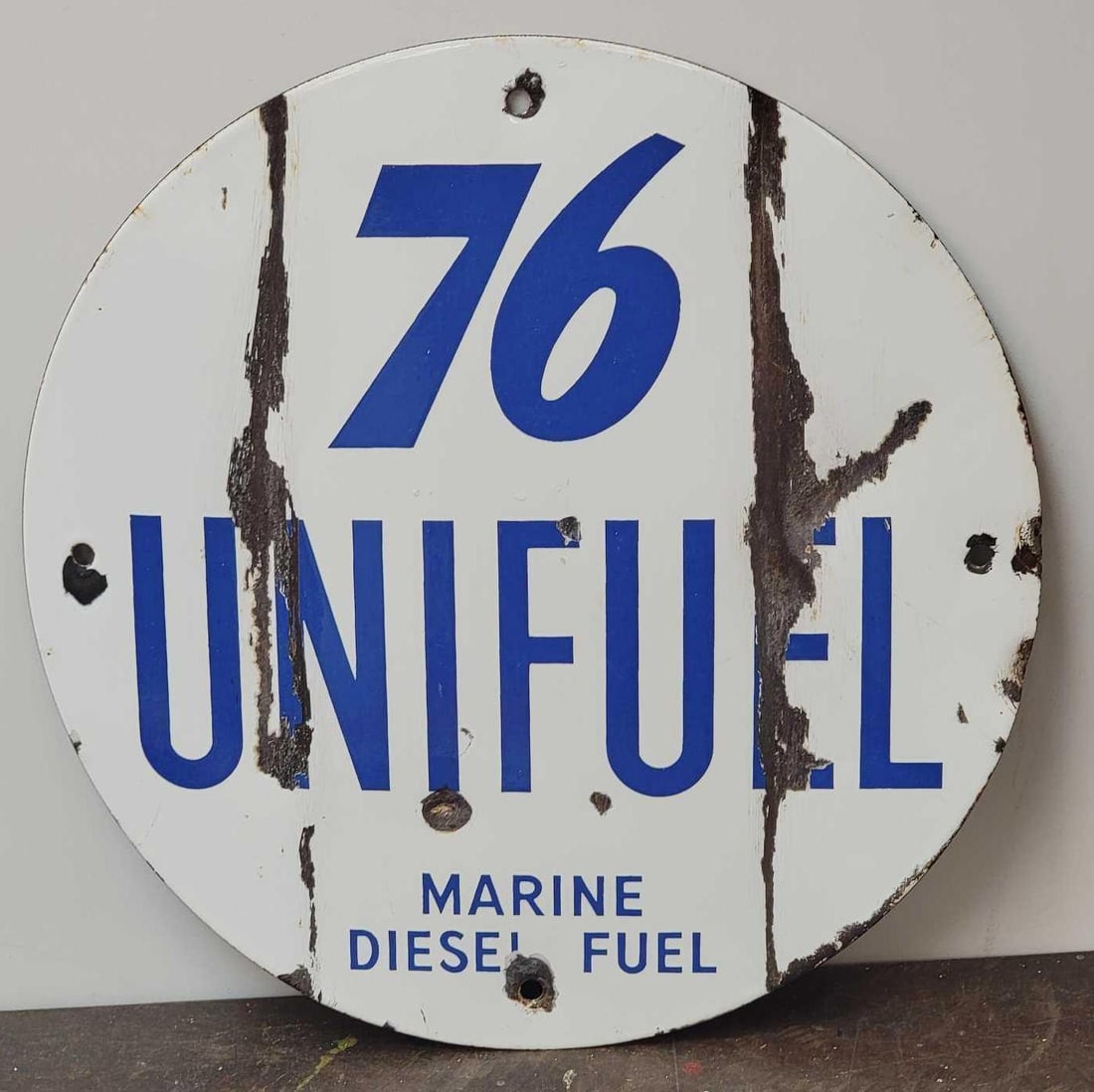 Union 76 Unifuel Marine Diesel Fuel Porcelain Pump Sign (TAC): rated 5.5, 11.5"D., the SSP sign has two vertical creases and chips, rarity 6. TAC #030835
