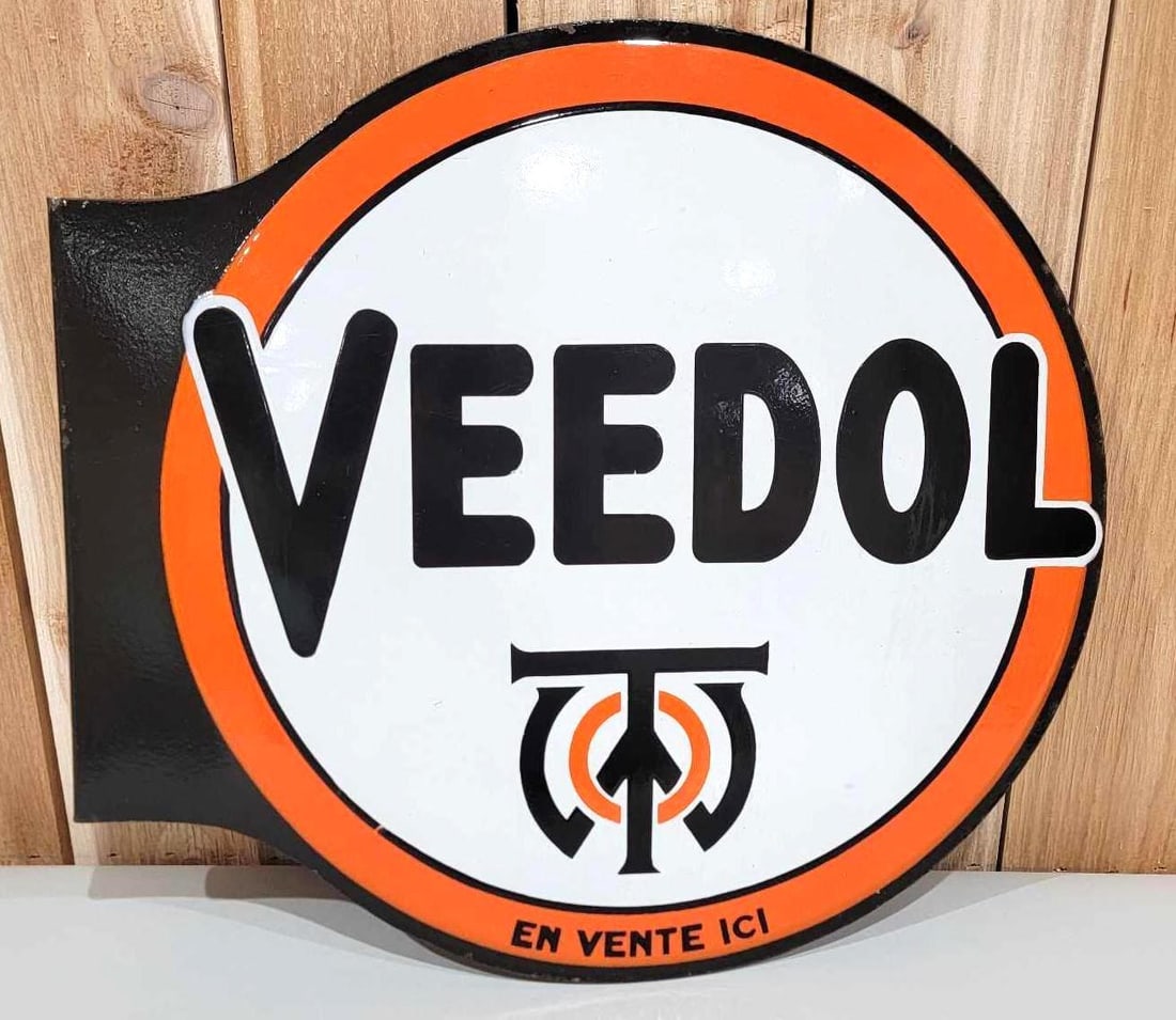 Veedol w/Logo Porcelain Flange Sign (TAC): rated 9 & 8.25, 19"x20.75", the diecut porcelain flange sign has excellent color and gloss, display is good, the reverse has large chip and stress lines. Rarity 3. TAC #059794