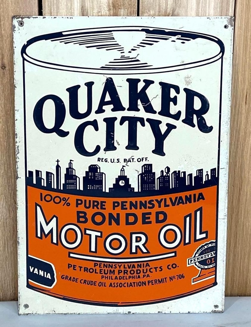 Quaker City Motor Oil Metal Sign (TAC): rated 8.25, 18.5"x13", the SST embossed sign has good color and shine, has scratches in the field, wear around the perimeter. Rarity 5. TAC #059112