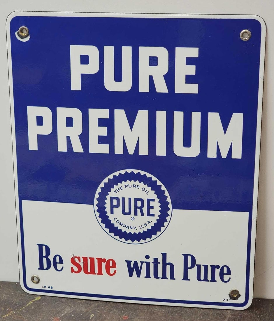Pure Premium w/Logo Porcelain Pump Sign (TAC): rated 9, 12"x10", the SSP sign has excellent color and gloss, field is clean, has small chips at two mounting holes, marked I.R., dated 1948, rarity 1. TAC #030852