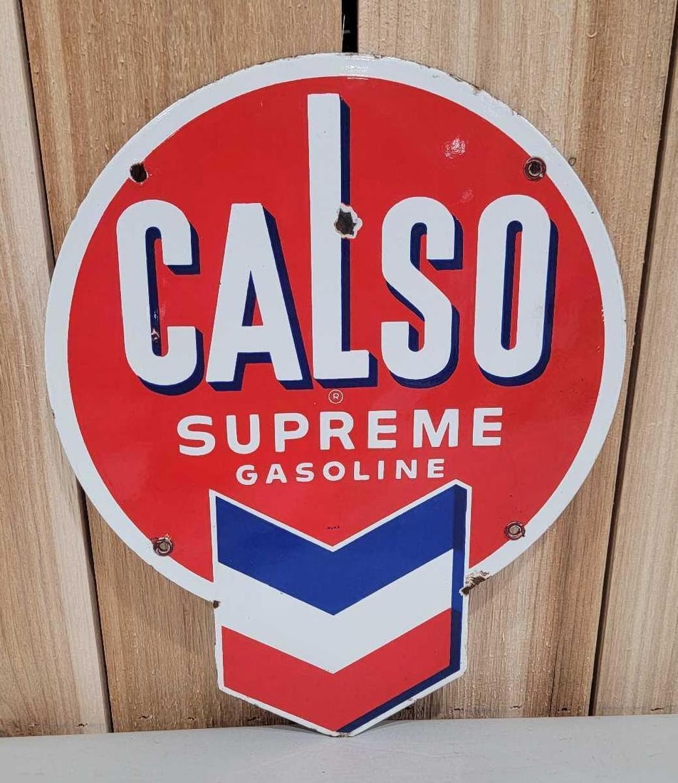 Calso Supreme Gasoline Porcelain Pump Sign (TAC): rated 8.25, 14"x11", the SSP diecut sign has good color and gloss, has small chip in the field and around the perimeter, marked McAx. Rarity 3. TAC #059939