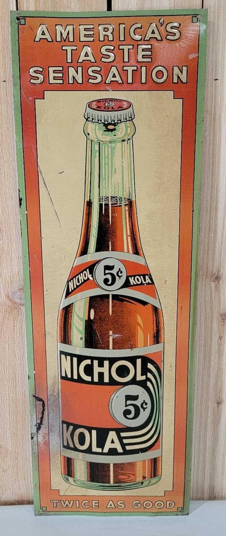 Nichol Kola "America's Taste Sensation" Metal Sign (TAC): rated 7, 35.5"x12", the SST embossed vertical sign has wear and paper marks, marked Parker. Rarity 2. TAC #059881