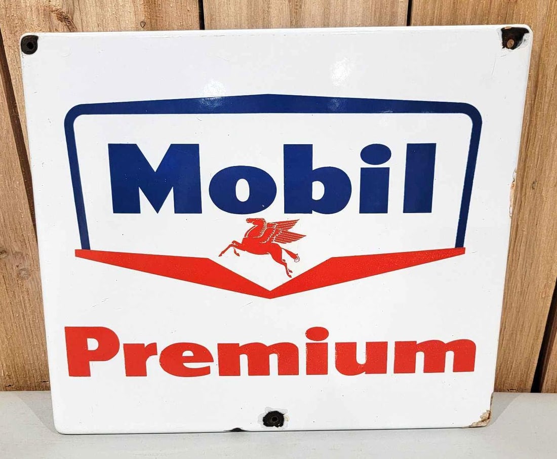 Mobil Premium Porcelain Pump Sign (TAC): rated 7.5, 13.5"x12", the SSP sign has good color and gloss, has three holes drilled around the perimeter. Rarity 1. TAC #059947
