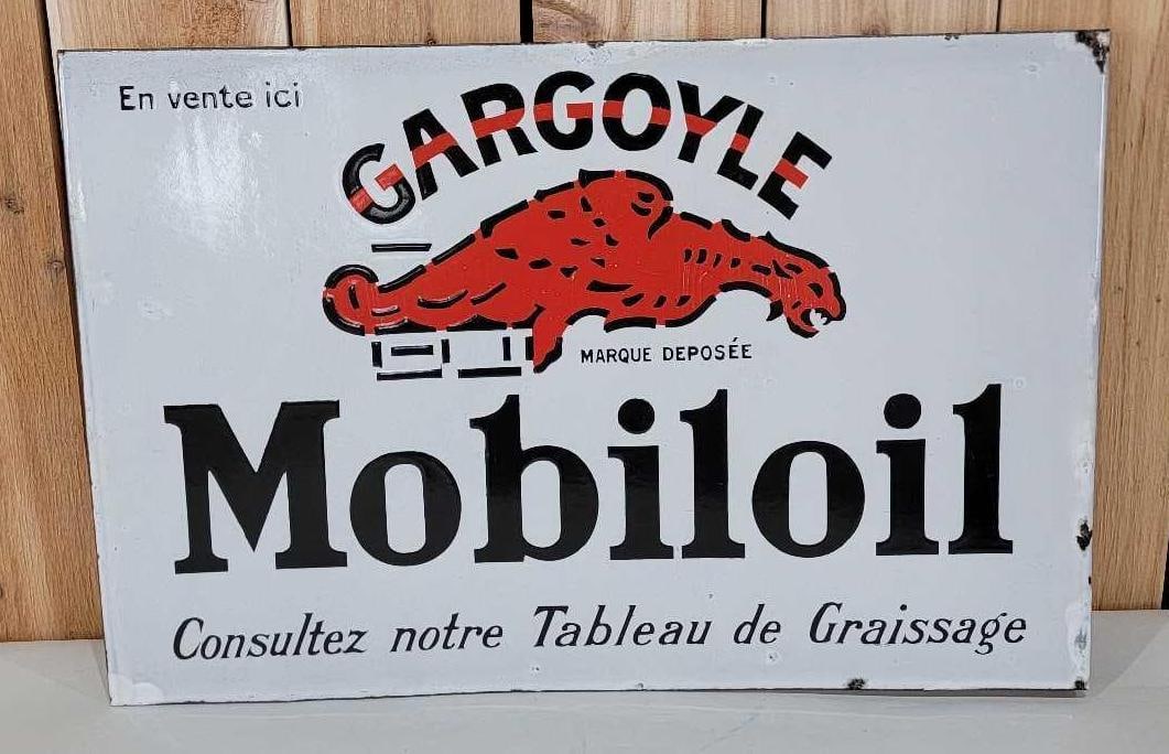 Gargoyle Mobiloil Porcelain Flange Sign (TAC): rated 9, 15.75"x23.75", the porcelain flange sign has excellent color and gloss, nice, has small chip at the outside edge, marked on the flange. Rarity 3. TAC #059252
