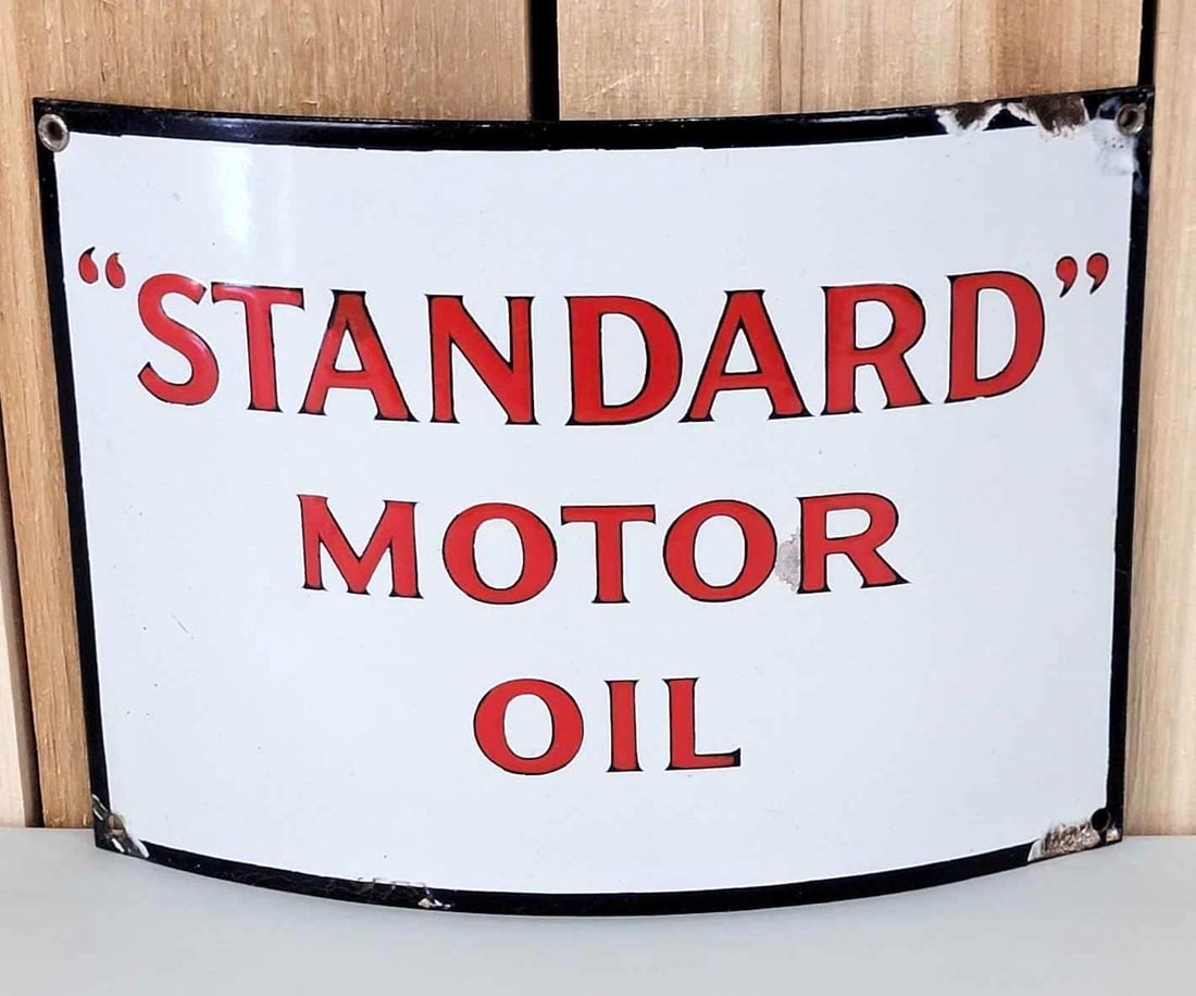 "Standard" Motor Oil Porcelain Sign (TAC): rated 8.9, 7.75'x11.7.5", the SSP curved sign has excellent color and gloss, has small spot, has chips around the perimeter. Rarity 4. TAC #060638