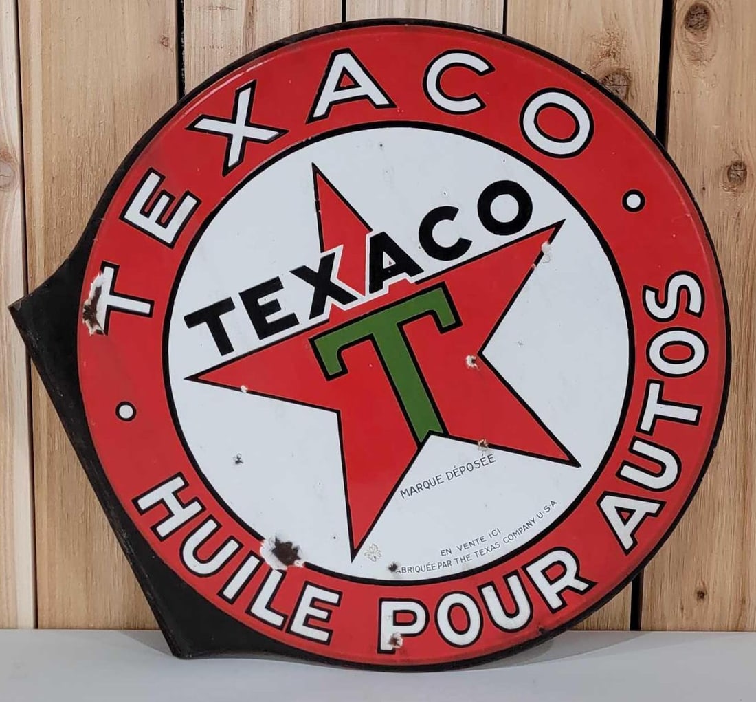 Texaco (black-T) Huile Pour Autos Porcelain Flange Sign (TAC): rated 8.5, 22.75"x23", the diecut porcelain flange sign has excellent color and gloss, has a few chips in the field, reverse has a few more. TAC #060709