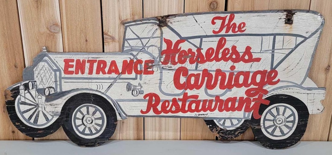 The Horseless Carriage Restaurant Entrance Wood Sign: rated 6., 20"x45", the double-sided sign has wear and paint loss