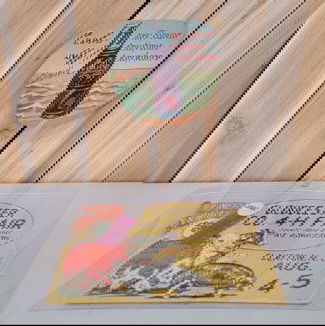 Nu Icy w/Bottle Hand Fan & 4-H Cardboard Sign: the Nu Icy hand fan is in good condition, the 4-H piece has wear and damage.