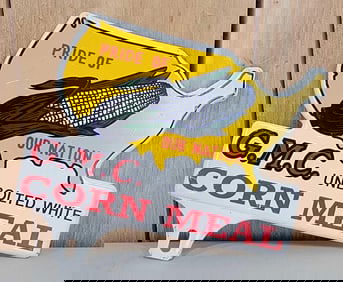 G.M.C. Corn Meal Metal License Plate Attachment