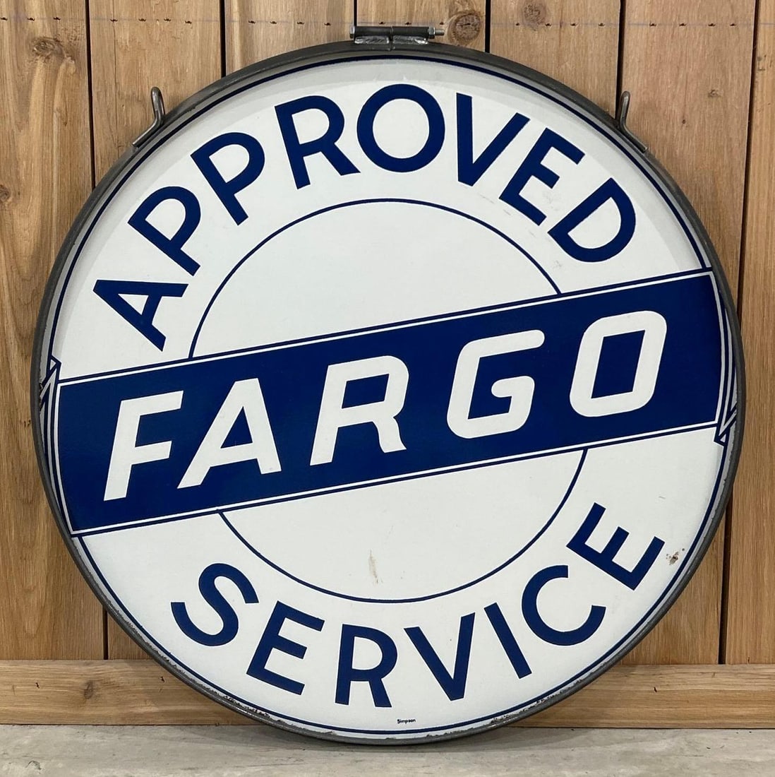 Fargo (truck) Approved Service Porcelain Sign (30)(TAC): rated 9, 30"D. This DSP sign has excellent color and gloss with clean fields. Sign has tiny chips around the perimeter. Marked Simpson. Rarity 7. TAC #033843
