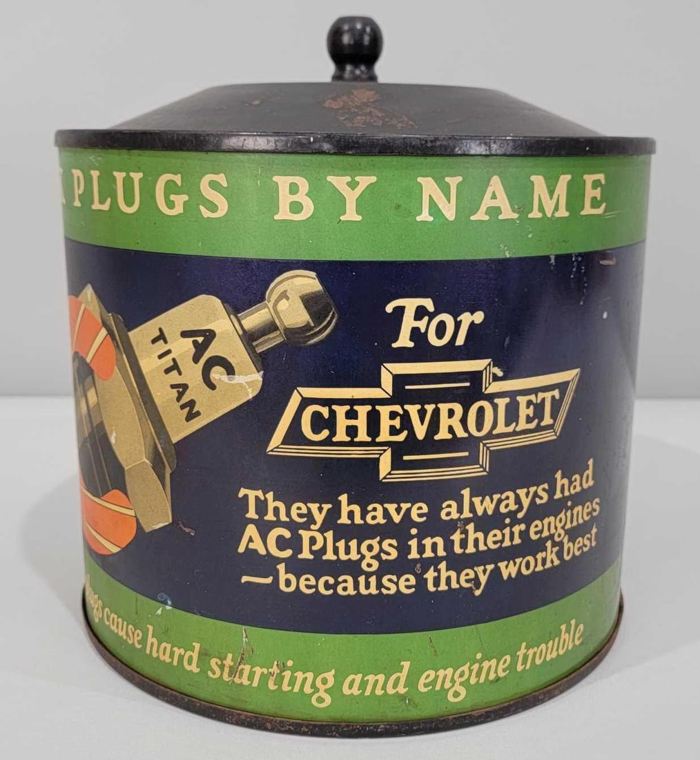 Rare AC Spark Plugs for Chevrolet Counter-Top Point of Sale Metal Display (TAC): rated 8.75, 11.5"x11"x11", the metal display has very good color and shine with light wear and a few fine scratches. Display is complete with product. This is the rarest of the AC Spark