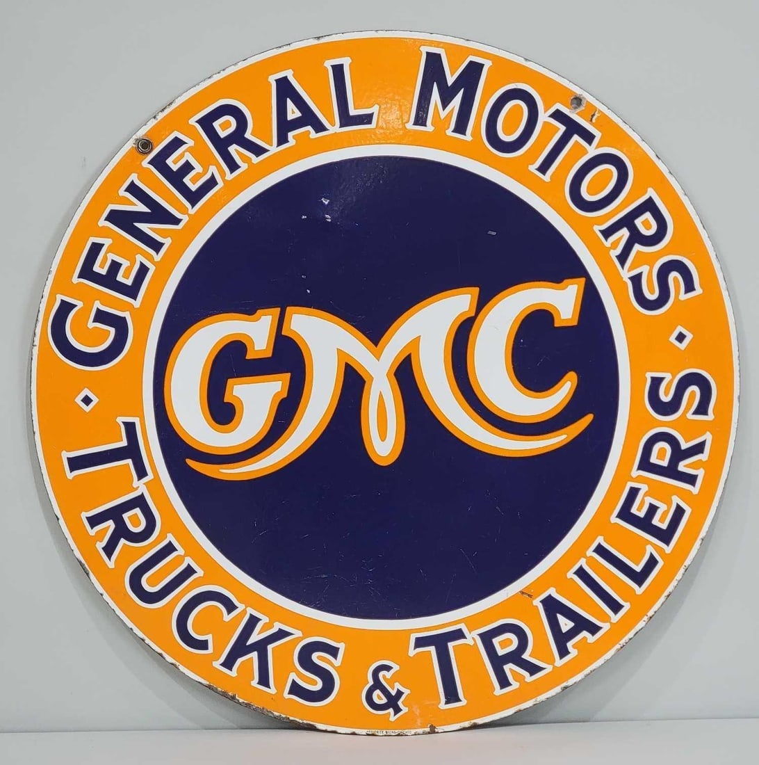 GMC General Motors Trucks & Trailers Porcelain Sign (TAC): rated 8.5 & 8, the 30"D. The DSP sign has good color and gloss. Display has wear, with tiny chips in the field and around the perimeter. The reverse side has a large chip in the field. Marked