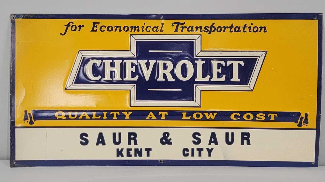 Chevrolet "for Economical Transportation" Metal Tacker Sign (TAC): rated 8.9, 11.25"x23.25". This SST embossed tacker sign has excellent color and shine with light wear in the field. Sign shows minor wear around the perimeter. Rarity 4. TAC #060817