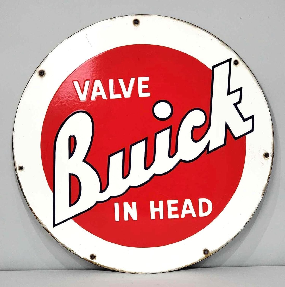 Buick Valve-in-Head Porcelain Sign (TAC): rated 9, 20"D. This SSP sign has excellent color and gloss. Outer edge needs cleaning. Originally attached to larger neon sign. Rarity 4. TAC #061016